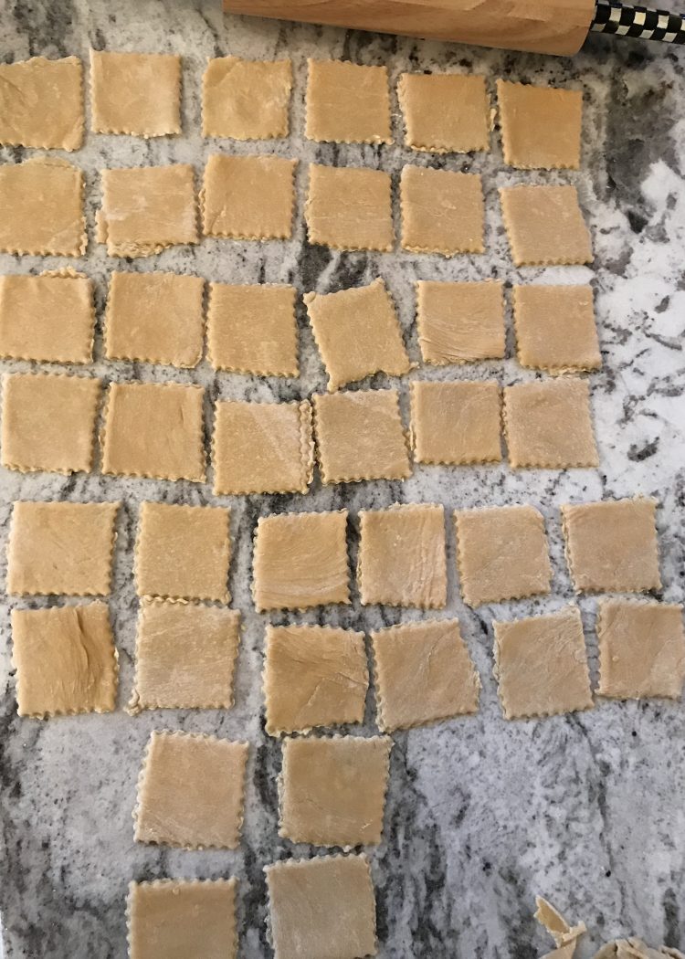 Cut out homemade ravioli pasta